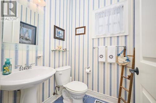 2 pc bath on main floor - 32 Sunrise Court, Fort Erie (Ridgeway), ON - Indoor Photo Showing Bathroom