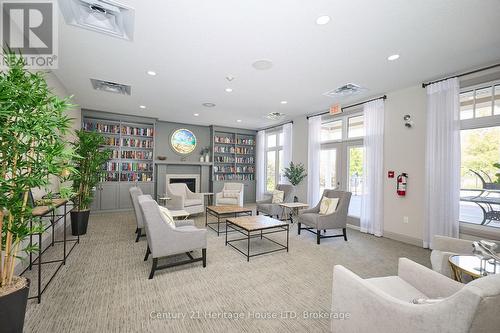 Community Center - Lounge - 32 Sunrise Court, Fort Erie (Ridgeway), ON - Indoor With Fireplace