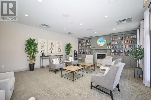 Community Center - Lounge - 32 Sunrise Court, Fort Erie (Ridgeway), ON - Indoor With Fireplace