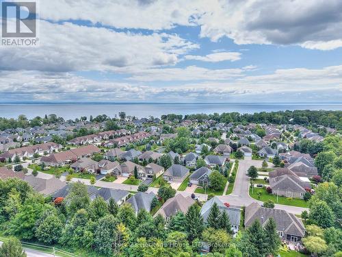Drone shot of the house and neighbourhood - 32 Sunrise Court, Fort Erie (Ridgeway), ON - Outdoor With Body Of Water With View