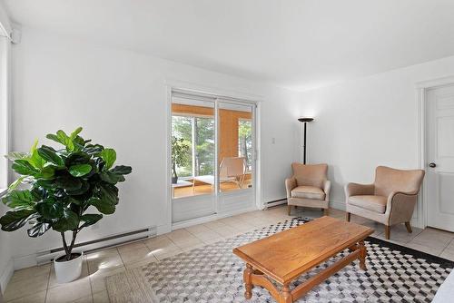 Salle familiale - 40 Ch. Des Catalpas, La Conception, QC - Indoor Photo Showing Living Room