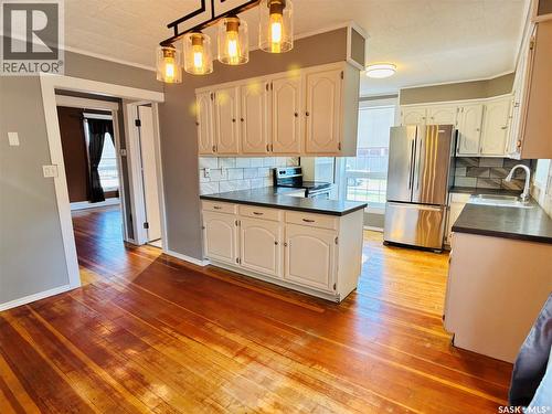 520 1St Street, North Portal, SK - Indoor Photo Showing Kitchen With Double Sink