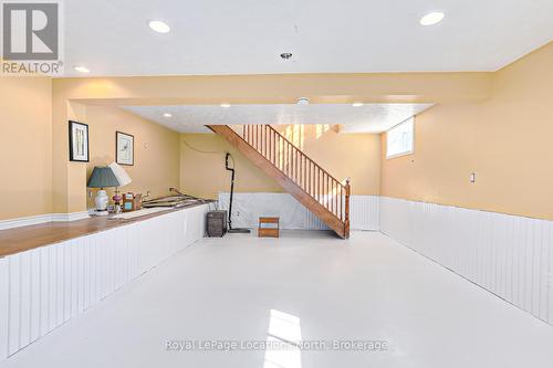 Basement rec room with gas fireplace. - 788070 Grey Road 13, Blue Mountains, ON - 