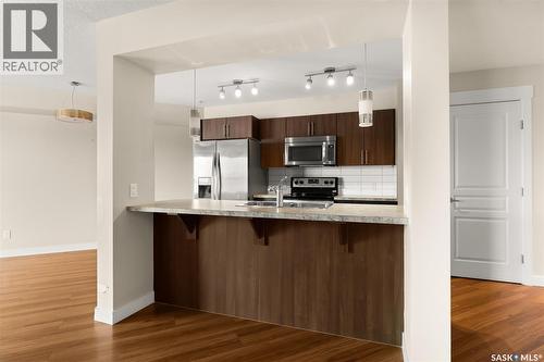 311 5301 Universal Crescent, Regina, SK - Indoor Photo Showing Kitchen With Upgraded Kitchen