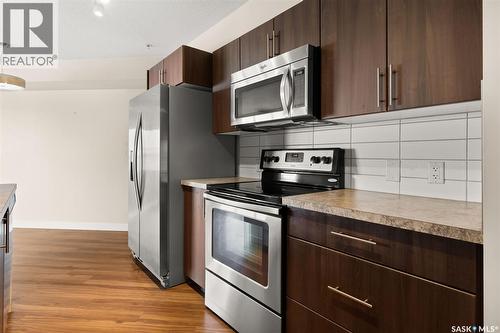 311 5301 Universal Crescent, Regina, SK - Indoor Photo Showing Kitchen With Stainless Steel Kitchen