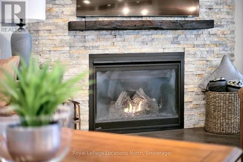 417 Mariners Way, Collingwood, ON - Indoor Photo Showing Living Room With Fireplace