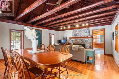 9936 Ontario Street, Lambton Shores (Port Franks), ON - Indoor Photo Showing Dining Room With Fireplace