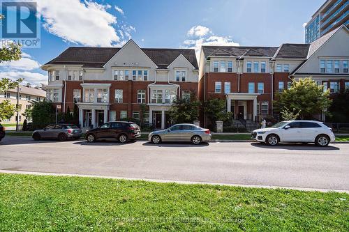 24 Michael Power Place, Toronto, ON - Outdoor With Balcony With Facade