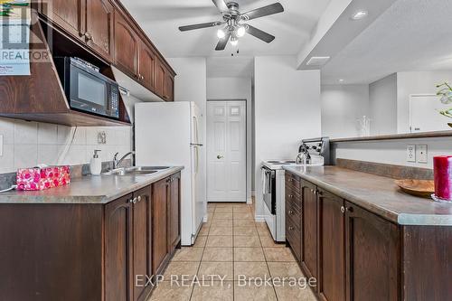 301 - 264 Oakdale Avenue, St. Catharines (Oakdale), ON - Indoor Photo Showing Kitchen With Double Sink
