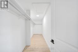 Primary Walk-in Closet - 