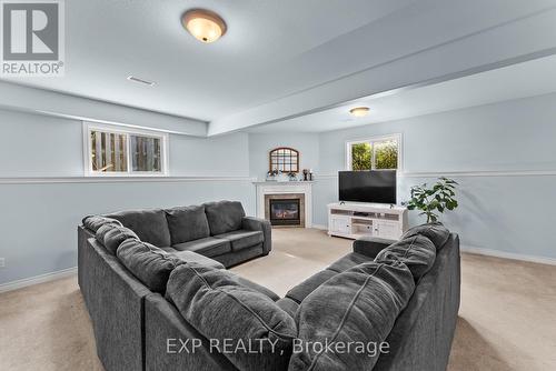 8 Lindan Street, West Lincoln (Smithville), ON - Indoor Photo Showing Living Room With Fireplace