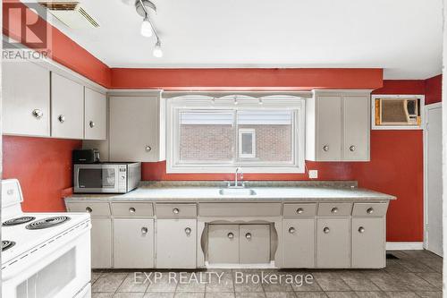 Main floor kitchen - 61 Radford Street, Hamilton (Ainslie Wood), ON - Indoor Photo Showing Kitchen With Double Sink