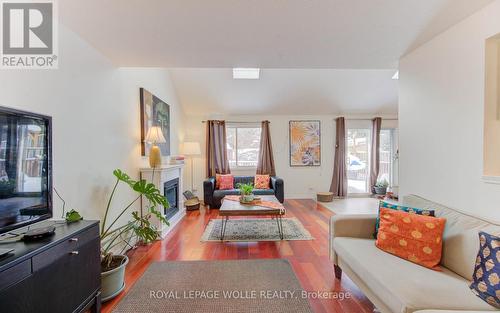 447 Brigantine Drive, Waterloo, ON - Indoor Photo Showing Living Room With Fireplace