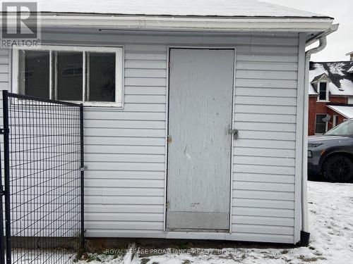 garage man door at side - 16 William Street, Brockville, ON - Outdoor With Exterior