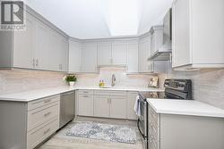 Updated kitchen with plenty of cupboard space - 