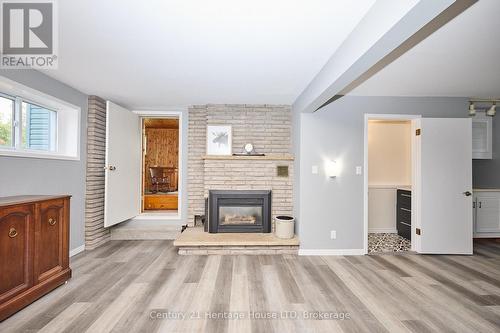 Rec room on the lower level - 15 Malkin Avenue, Fort Erie (Lakeshore), ON - Indoor Photo Showing Living Room With Fireplace