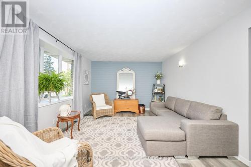Bright living room with large window - 15 Malkin Avenue, Fort Erie (Lakeshore), ON - Indoor Photo Showing Living Room