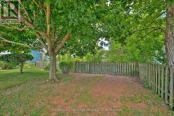 Side lot in front of the property - 