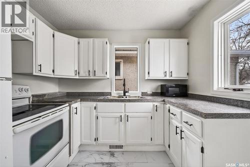 1216 Mctavish Street, Regina, SK - Indoor Photo Showing Kitchen With Double Sink
