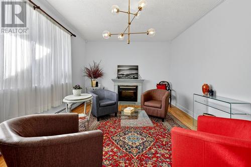 44 Dock Road, Bareneed, NL - Indoor Photo Showing Other Room With Fireplace