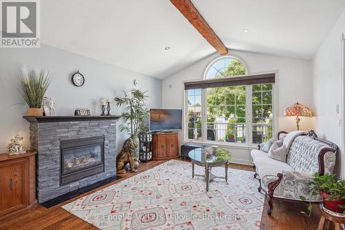 339 Wellbrook Avenue, Welland (Prince Charles), ON - Indoor Photo Showing Living Room With Fireplace