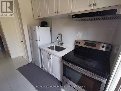 Middle - 84 Harrington Crescent, Toronto, ON - Indoor Photo Showing Kitchen
