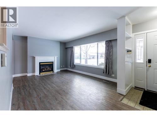 282 Irwin Street, Prince George, BC - Indoor Photo Showing Living Room With Fireplace