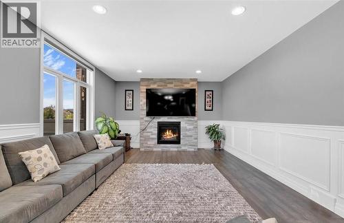 1099 Vincent Crescent, Lakeshore, ON - Indoor Photo Showing Living Room With Fireplace