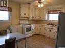 311 3Rd Avenue E, Leader, SK  - Indoor Photo Showing Kitchen With Double Sink 