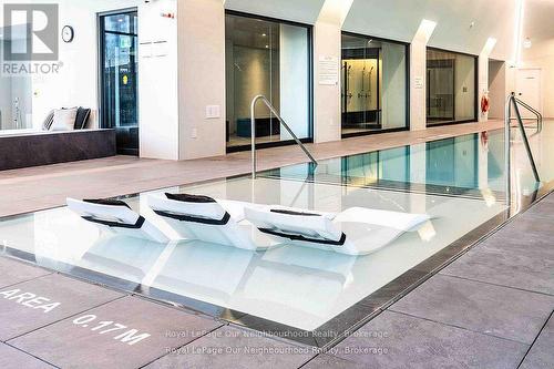 231 - 2450 Old Bronte Road, Oakville (Wm Westmount), ON - Indoor Photo Showing Other Room With In Ground Pool