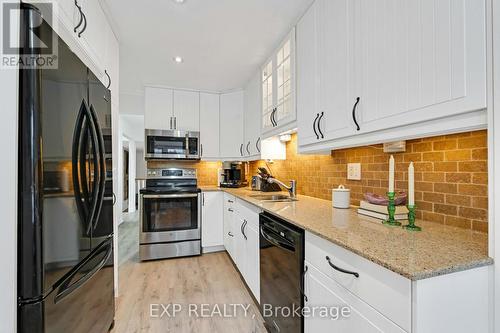 4208 Stonemason Crescent, Mississauga, ON - Indoor Photo Showing Kitchen With Double Sink