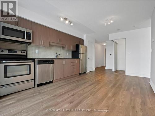 308 - 30 Herons Hill Way, Toronto, ON - Indoor Photo Showing Kitchen