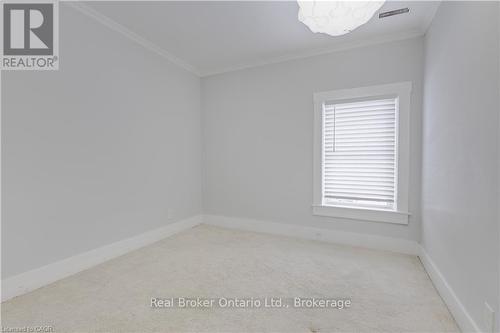 Spare Bedroom with walk-in cedar closet - 808 Monmouth Road, Essex, ON - Indoor Photo Showing Other Room