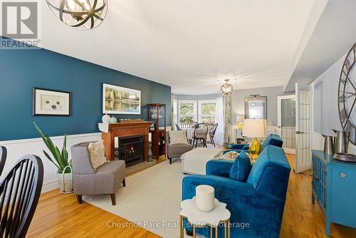 75 Pond Crescent, Huntsville (Chaffey), ON - Indoor Photo Showing Living Room With Fireplace