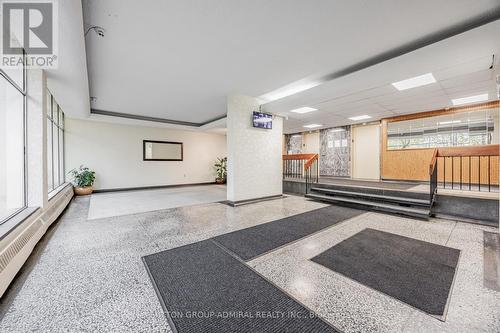 Main entrance hallway just steps from the elevator - 209 - 2245 Eglinton Avenue E, Toronto, ON - Indoor