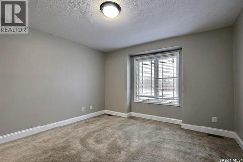 12 Mckenzie Lane, White City, SK - Indoor Photo Showing Other Room
