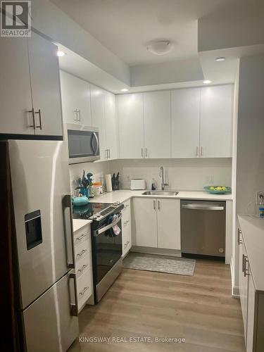 1002 - 3220 William Coltson Avenue, Oakville, ON - Indoor Photo Showing Kitchen With Double Sink