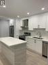 101 - 12 Mansfield Avenue, Toronto, ON  - Indoor Photo Showing Kitchen With Double Sink With Upgraded Kitchen 