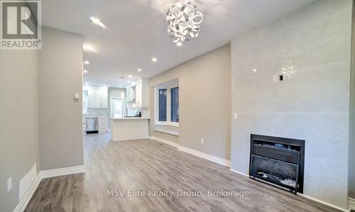 A - 58 Bellhaven Road, Toronto, ON - Indoor With Fireplace