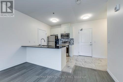309 - 1360 Costigan Road, Milton, ON - Indoor Photo Showing Kitchen