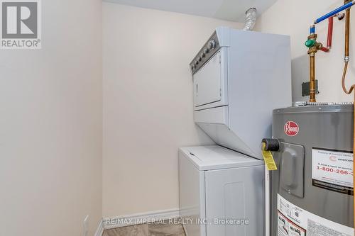 washer and dryer - 309 - 1360 Costigan Road, Milton, ON - Indoor Photo Showing Laundry Room