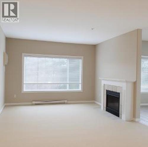 688 Lequime Road Unit# 203, Kelowna, BC - Indoor With Fireplace