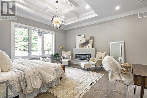 10 Philips Road, Whitby, ON - Indoor Photo Showing Bedroom With Fireplace