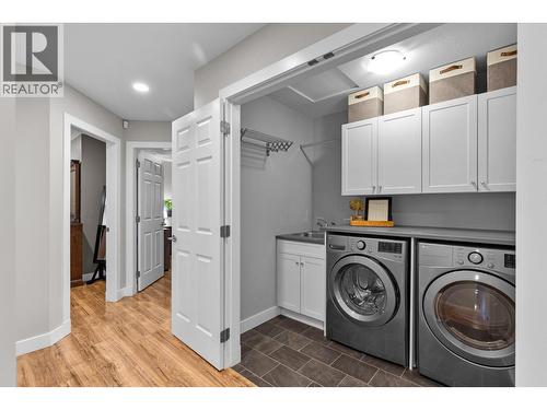 Upstairs laundry - 13265 Apex Drive, Lake Country, BC - Indoor Photo Showing Laundry Room
