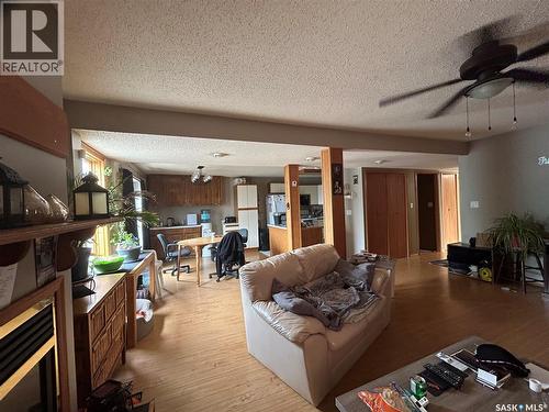 4 Main Street, Rhein, SK - Indoor Photo Showing Other Room With Fireplace