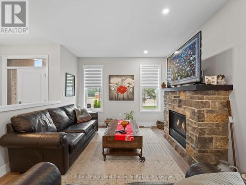 34 Yost Court, Perth East (Milverton), ON - Indoor Photo Showing Living Room With Fireplace