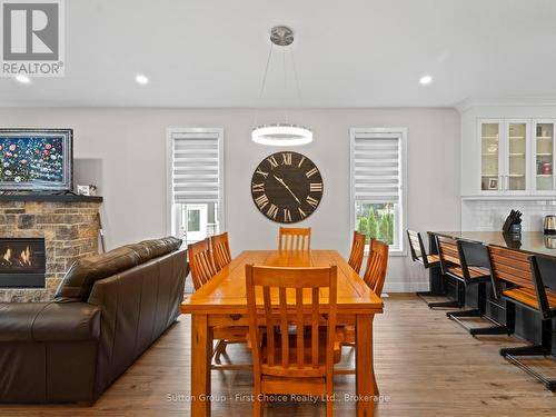 34 Yost Court, Perth East (Milverton), ON - Indoor Photo Showing Dining Room With Fireplace