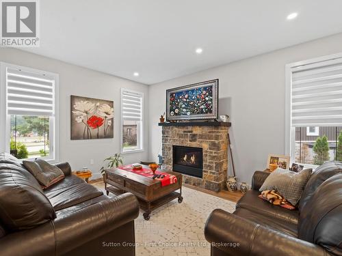 34 Yost Court, Perth East (Milverton), ON - Indoor Photo Showing Living Room With Fireplace
