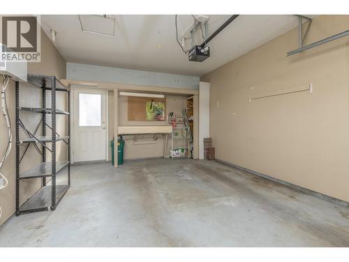 111 Harbourfront Drive Nw Unit# 14, Salmon Arm, BC - Indoor Photo Showing Garage