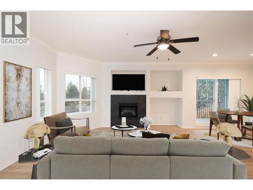 202 12090 227 Street, Maple Ridge, BC - Indoor Photo Showing Living Room With Fireplace